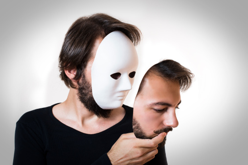 Two faced male, real face is actually mask.