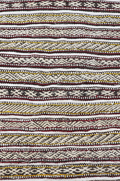 istock Pattern of a traditional handmade Moroccan Berber carpet. 504601736