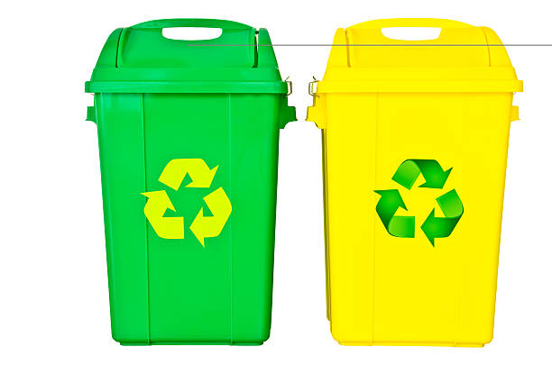 istock green and yellow recycle bin 504602417