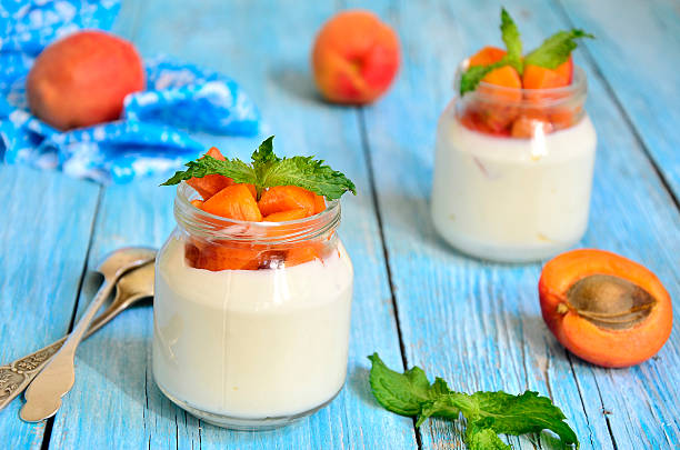 istock Greek yogurt with apricoits in the jar. 504605155