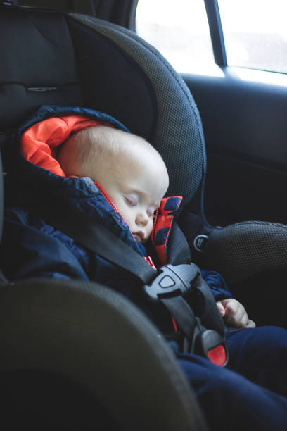 istock Baby Boy sleeping in car seat 504605982