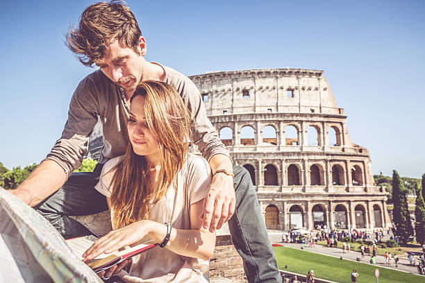 istock Tourists couple and the Coliseum 504606109