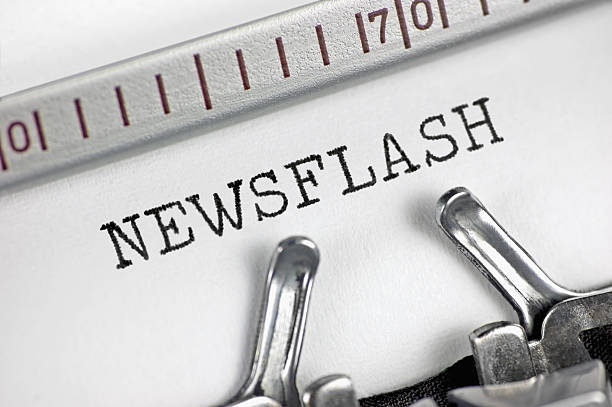 istock Typewriter detailed macro closeup typing text Newsflash, large detailed concept 504606610