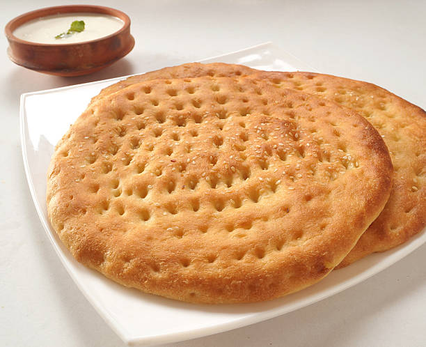Sesame Kulcha A traditional Pakistani and Indian bread taftan stock pictures, royalty-free photos & images