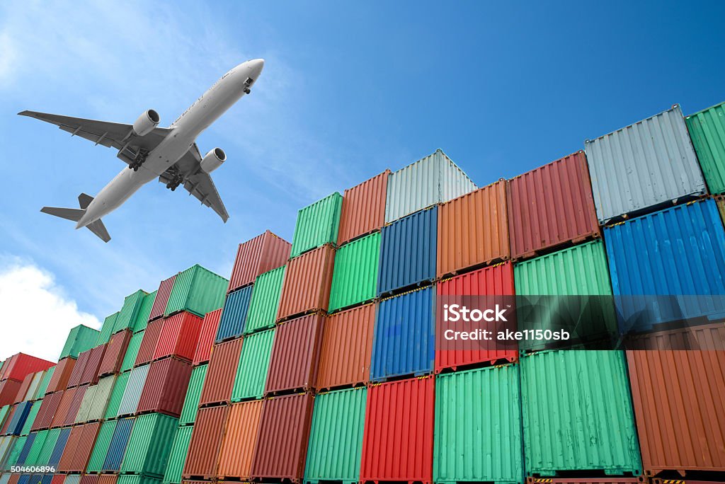 Stack of Cargo Containers at the docks Freight Transportation Stock Photo