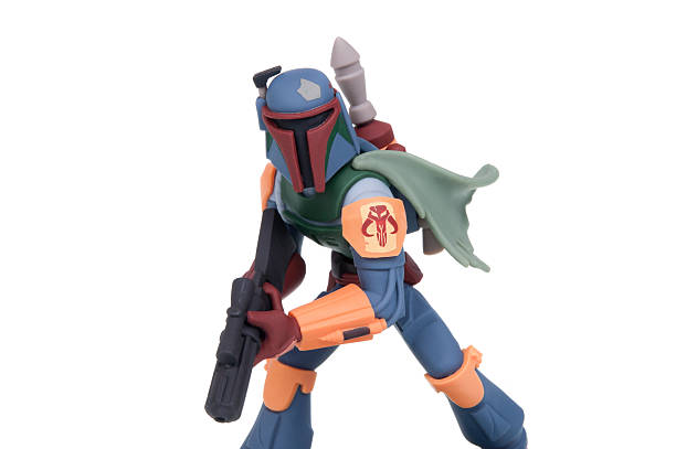 Boba Fett Disney Infinity 3.0 Figurine Adelaide, Australia - January 07, 2015: A studio shot of a Boba Fett Disney Infinity 3.0 Figurine from the Star Wars movies. Merchandise from the Star Wars movies are highly sought after collectables. bounty hunter stock pictures, royalty-free photos & images