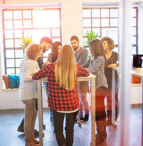 istock young people having meeting at the office 504608140