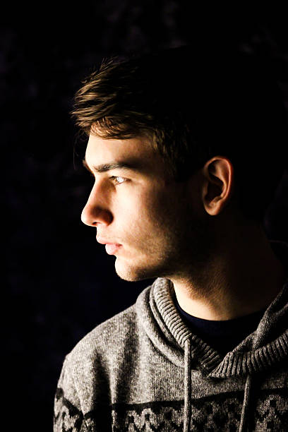 istock Side Profile of Teenager Posing For Camera 504608312