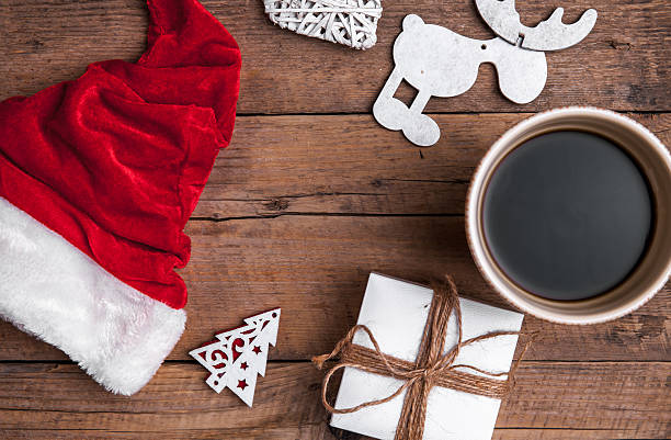 istock Cup of coffee and Santas hat, Christmas set 504608698