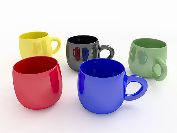 istock colorful coffee mugs on a white background 504612402