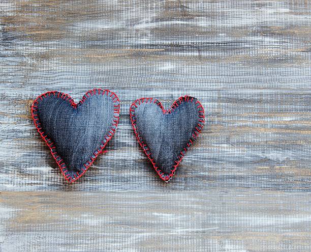 istock Denim hearts on a wooden background for Valentine's Day 504612496