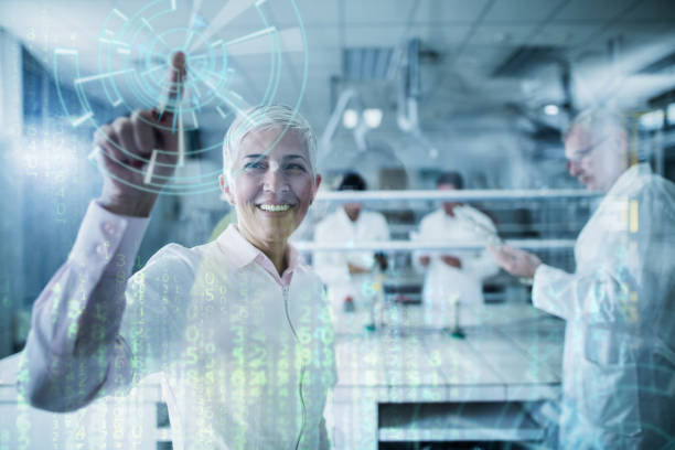Happy scientist working on futuristic innovation on a touch screen.
