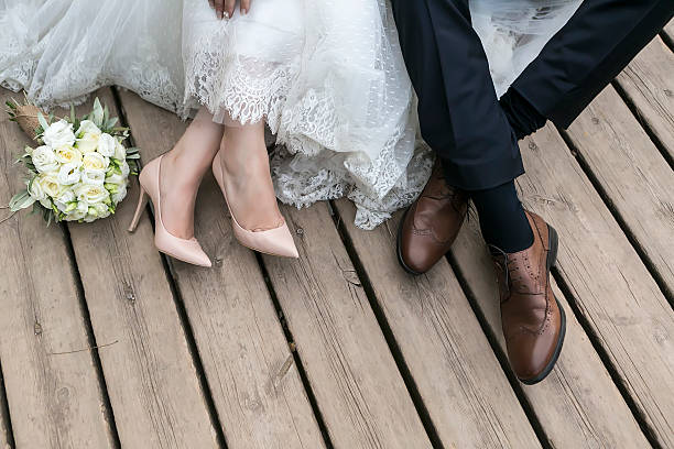 Feet Of Bride And Groom Wedding Shoes Stock Photo - Download Image Now -  Istock