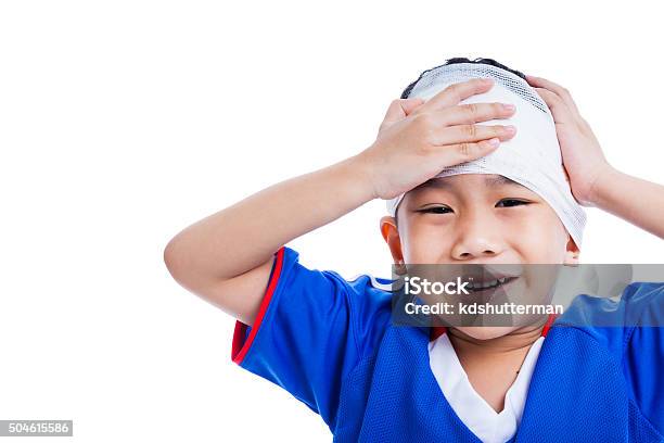 Youth Athlete Asian Child With Trauma Of The Head Crying Stock Photo - Download Image Now