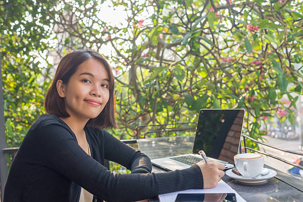 istock Asian university student studying in the sunny day 504616128