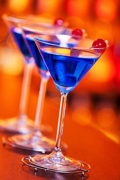 istock Blue Martini cocktail on a bar 504618212