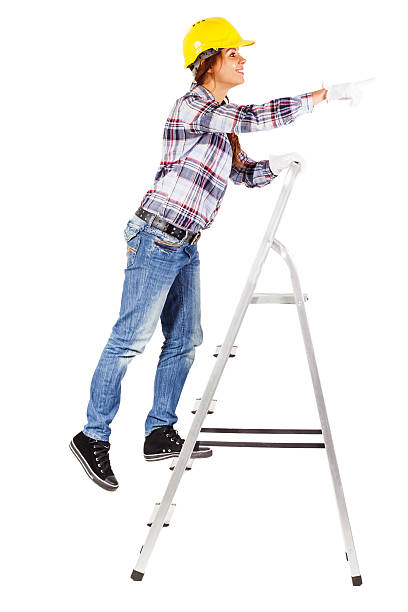 istock Young worker stands on the stairs looks straight ahead 504633650