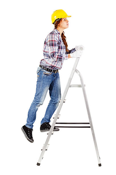 istock Young worker stands on the stairs looks straight ahead 504633672