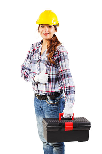 istock Young smiling worker in the helmet holds tool box 504633874
