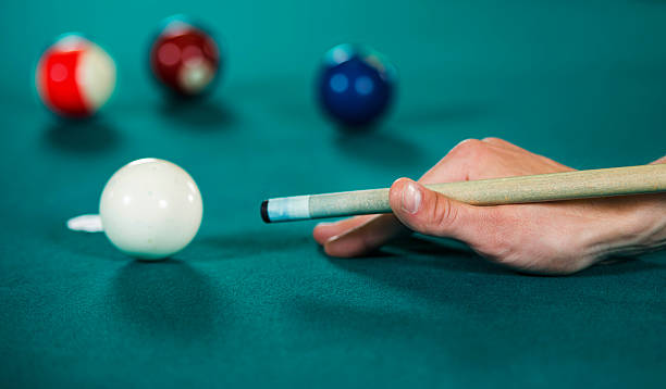 istock Unrecognizable person playing billiard. 504634004
