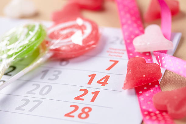 istock candy on a stick for Valentine's day on calendar 504636384