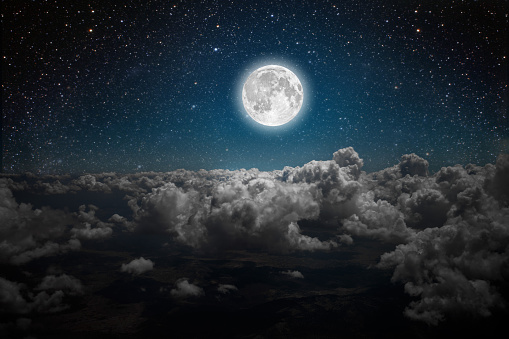 backgrounds night sky with stars and moon and clouds. Elements of this image furnished by NASA