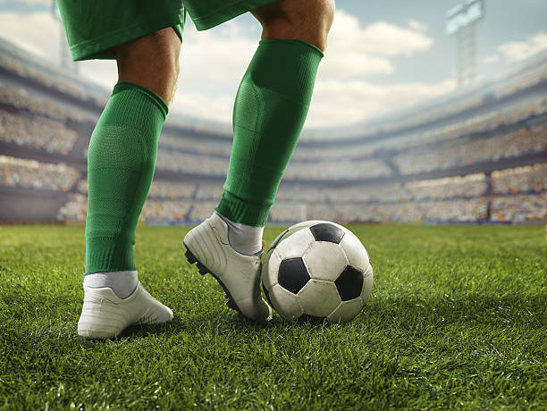 istock Close up soccer player with ball 504637230