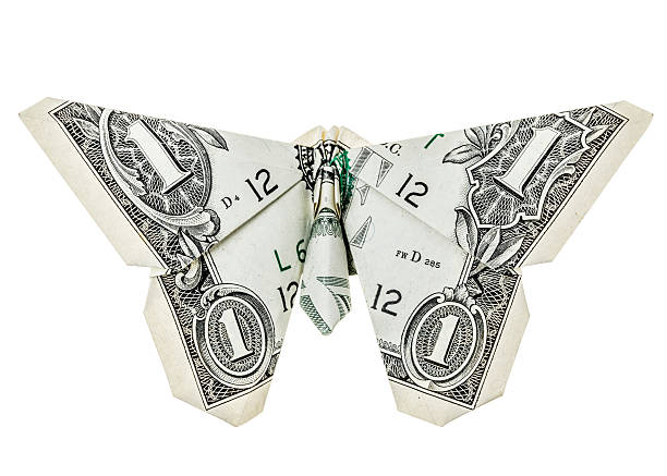 Dollar origami butterfly Dollar origami butterfly isolated on white making money origami stock pictures, royalty-free photos & images