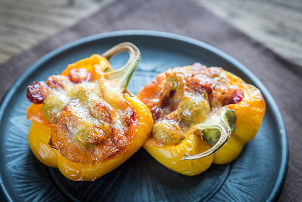 istock Stuffed peppers with sausages and mozzarella topping 504641004