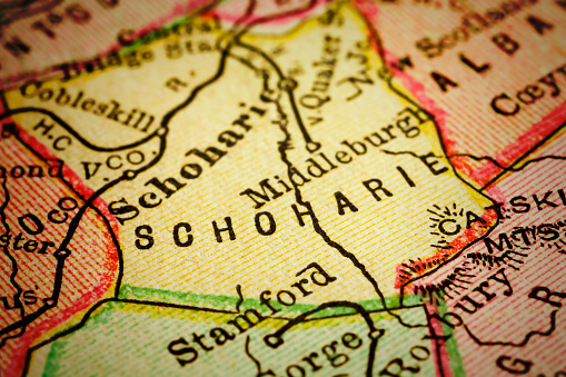 Close up on an antique map of the county of Schoharie, state of New York. Published in 1884; Rand McNally and Co; Chicago. Selective focus and Canon EOS 5D Mark II with MP-E 65mm macro lens.