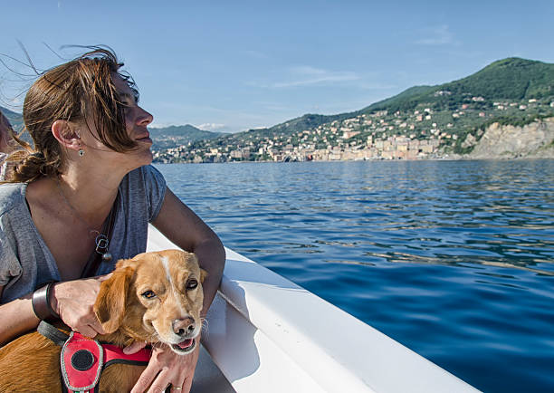 istock Woman and her dog on board 504641974
