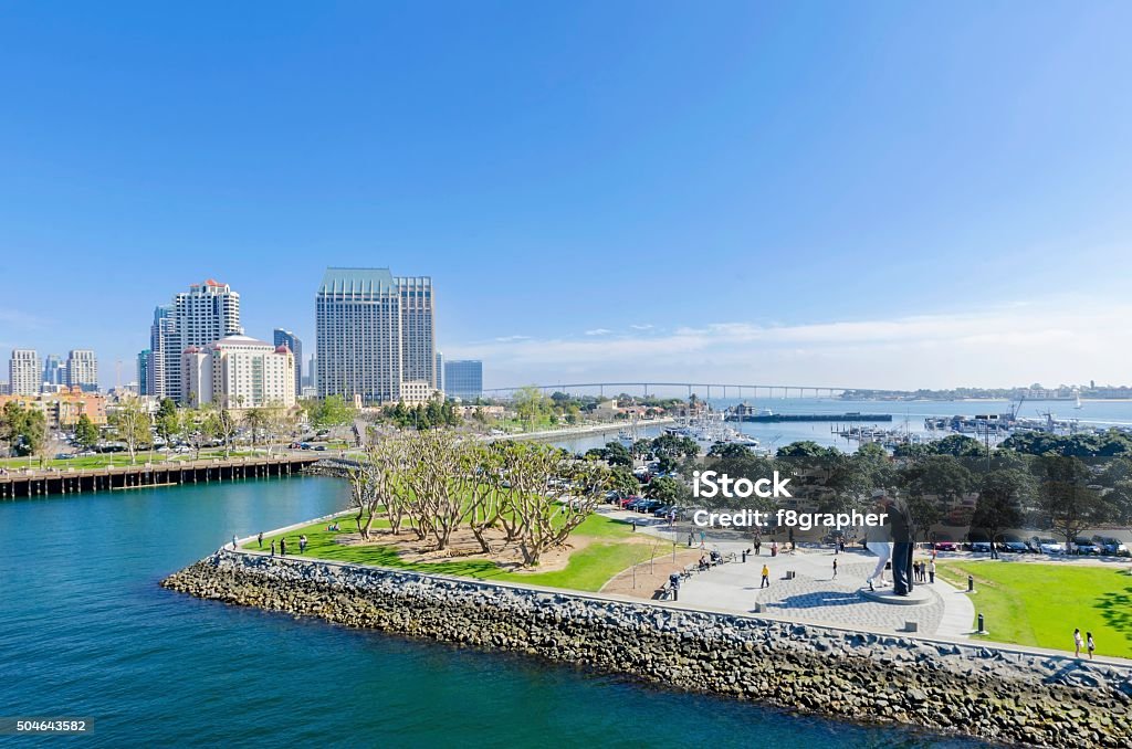 Downtown San Diego, California A view of the Unconditional surrender statue in Downtown San Diego marina in southern California in the United States of America. Some of the local architecture, commercial buildings and the coronado bridge in the city. San Diego Stock Photo