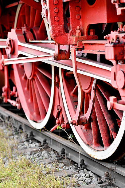 istock Old steam train driving wheel mechanism 504644016