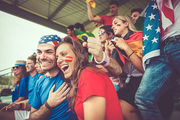 istock Group of multiracial nations supporters together 504646010