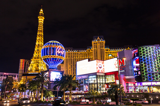 LAS VEGAS, Nevada, USA - AUGUST 11, 2015: View of the Paris Las Vegas hotel and casino at night on August 11, 2015 in Las Vegas, USA. Located on the Las Vegas Strip, its theme is the city of Paris, France.