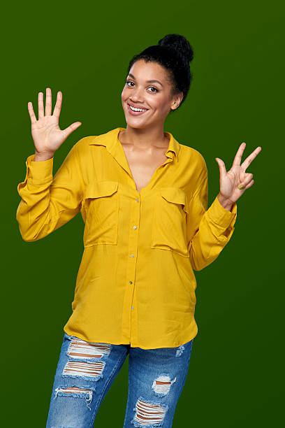 istock Woman showing eight fingers 504648404