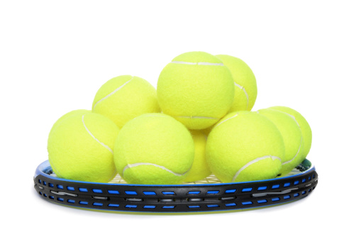 Tennis ball on court green floor close up selective focus