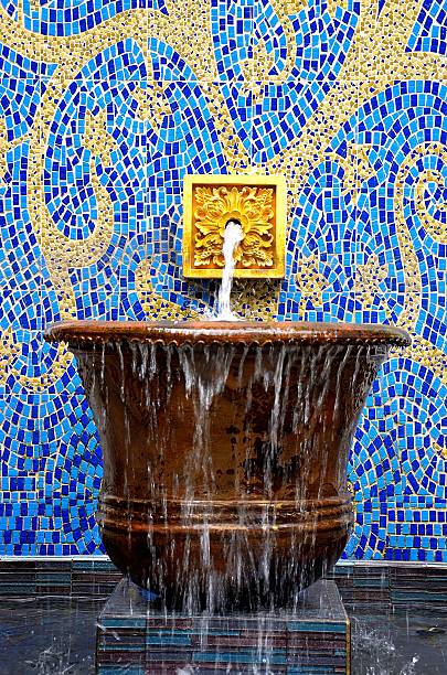 istock Water fountain with abstract background 504652645