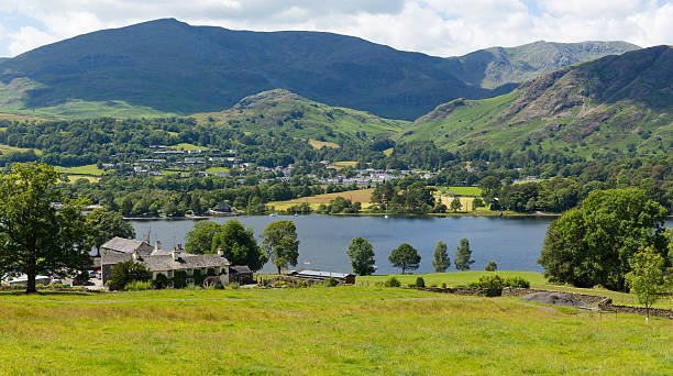istock Coniston Lake District England uk with mountain on summer day 504654211