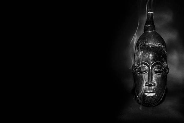 istock Magical african tribal mask with smoke 504654299