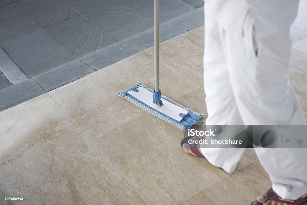 Mopping the floor Dry Stock Photo
