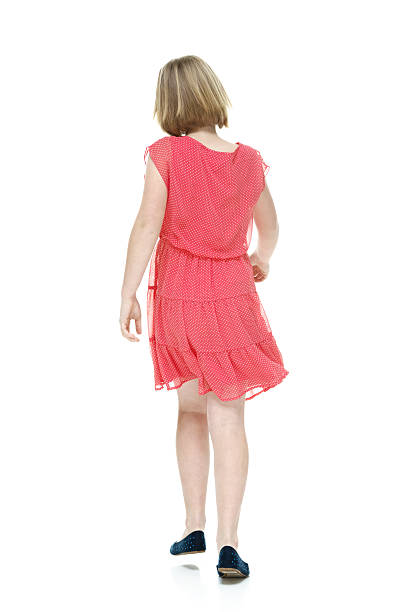 istock Rear view of girl walking 504657515