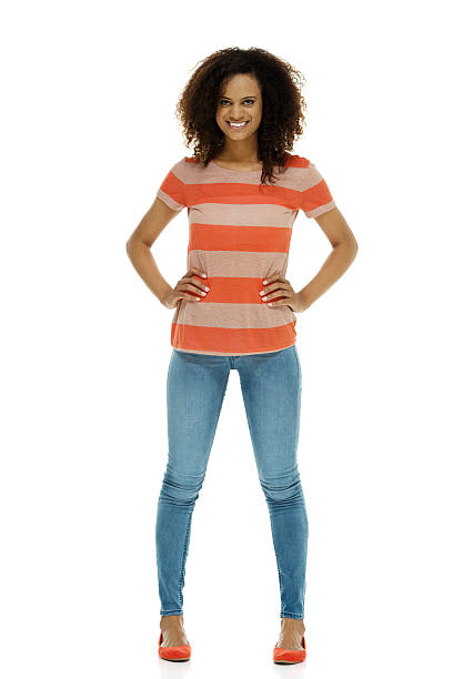 istock Cheerful woman standing & looking at camera 504657519