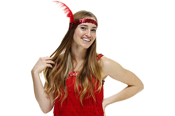 istock Smiling woman in flapper dress & looking at camera 504657591