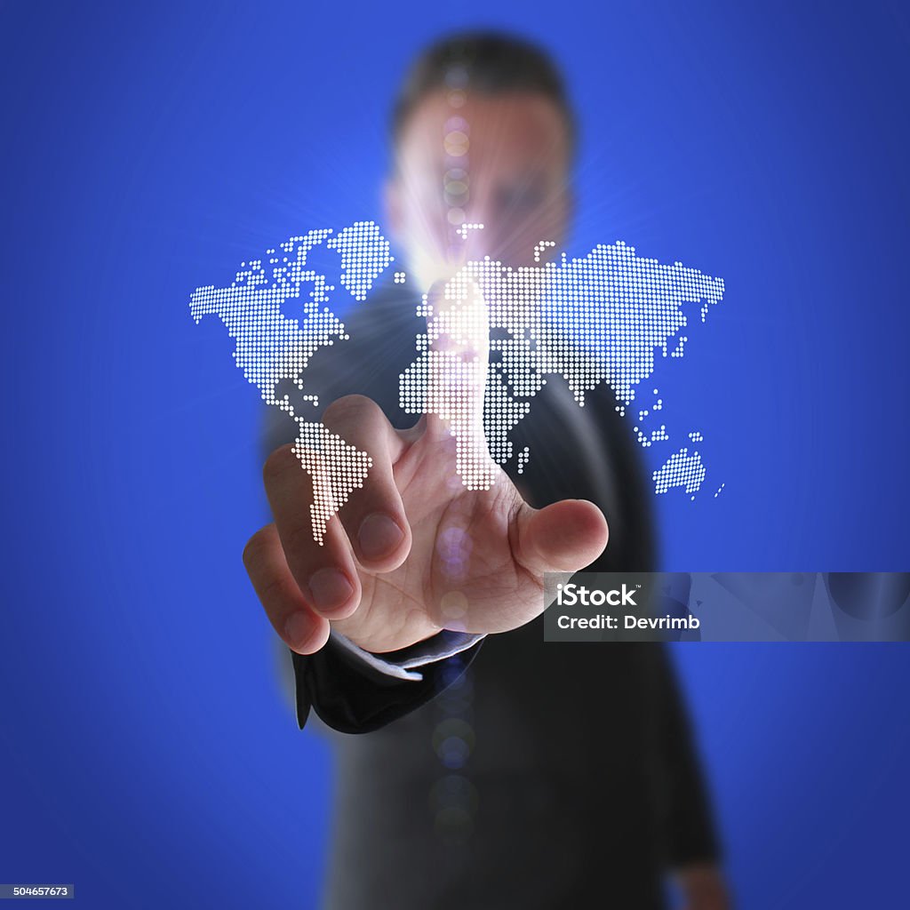 Businessman and Digital Dotted World Map Businessmen will rule the world. Accessibility Stock Photo