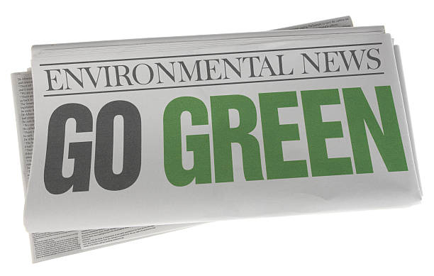 istock Go Green - Stock Image of Newspaper on White 504658169