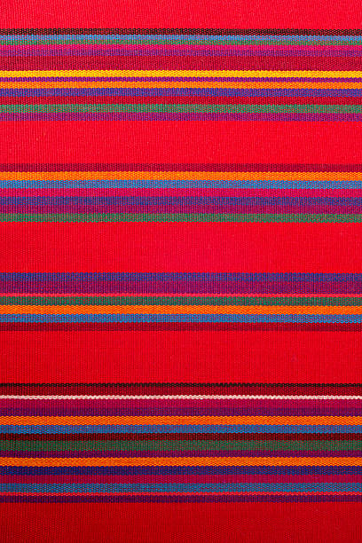 raditional Anatolian kilim decorated with geometric patterns in red, blue, yellow, and white. The flatwoven carpet highlights cultural textile heritage and handwoven craftsmanship.