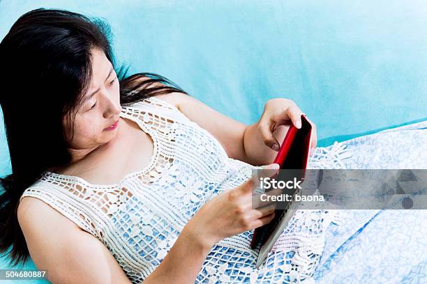 Using Tablet Computer Stock Photo - Download Image Now - Adult, Adults Only, Asian and Indian Ethnicities