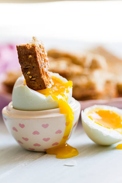 istock Opened boiled blue duck egg with soft yolk with toast 504683985