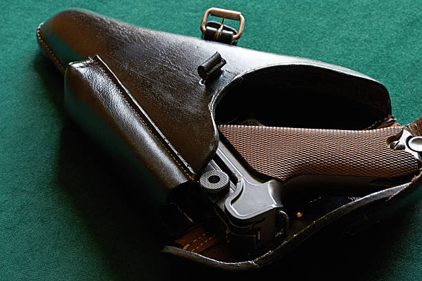 istock Parabellum pistol in a holster 504684417